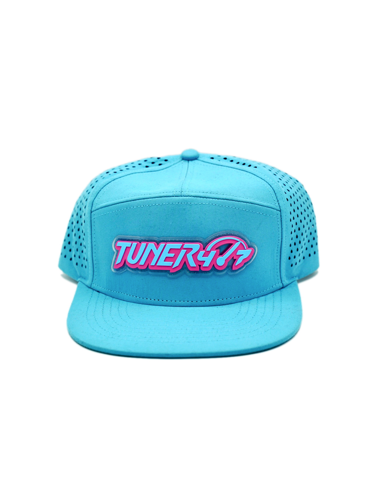 Blue TUNER4/7 flat-brim hat with pink-accented logo lettering and perforated side panels.